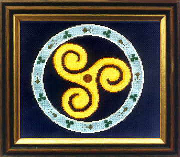 Celtic Triskele Symbol Cross .