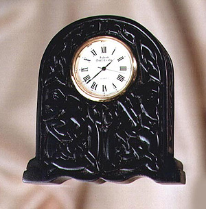 Newgrange Irish Turf Clock Newgrange Irish Turf Clock
(Measures 3.5" x 3" x 1.5" inch)
