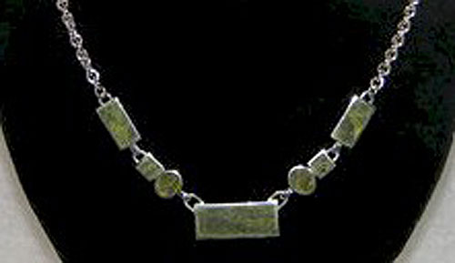 7 Stone Chunky Multi Necklace on Silver Chain 7 Stone Chunky Multi Necklace on Silver Chain
(Connemara Marble)