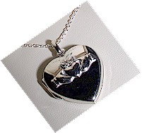 Sterling Silver Heart Claddagh Inset Locket Sterling Silver Heart Claddagh Inset Locket